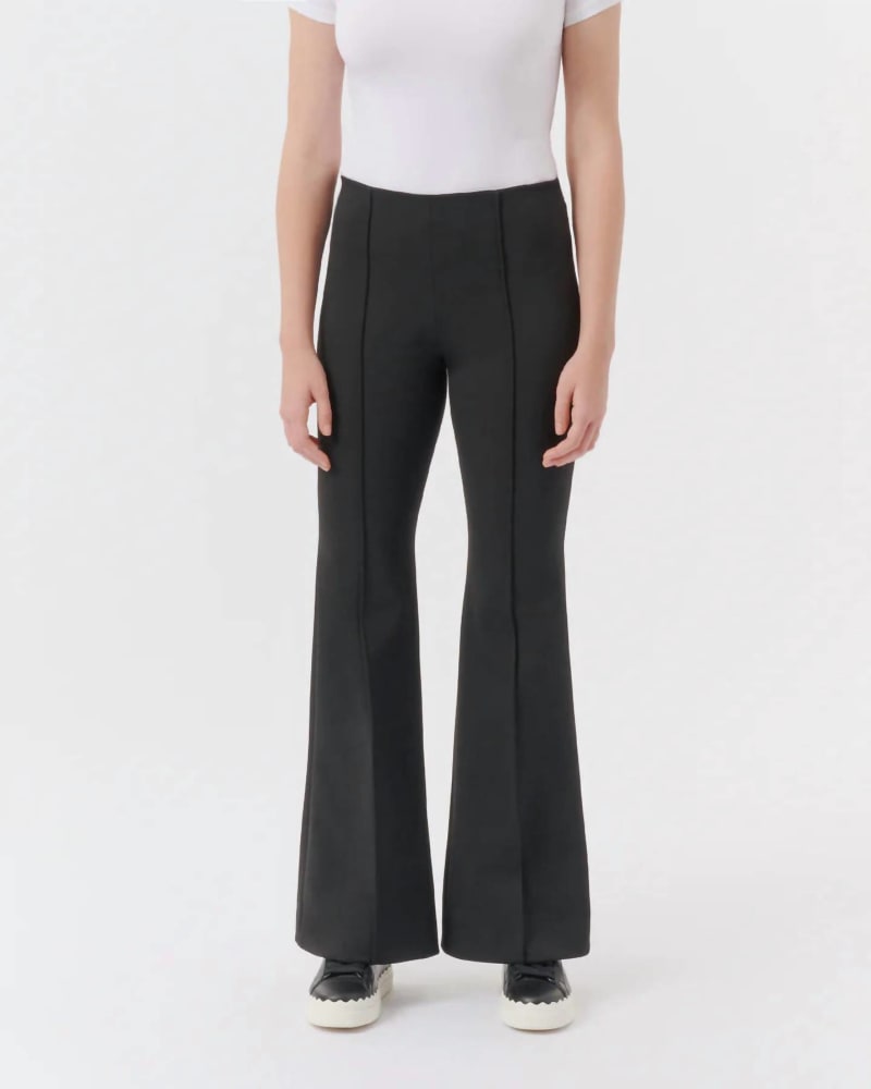 Front of a model wearing a size 10 Ponte Flare Pant In Black in Black by ATM. | dia_product_style_image_id:347336